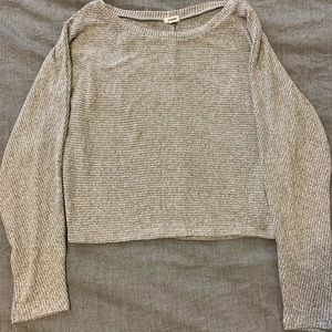 Grey ribbed sweater.